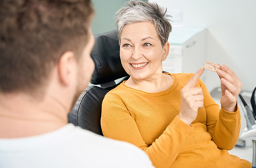 A prosthodontist can help treat more complex cases of restorations and tooth replacement